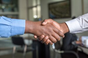hands-shaking-in-business-deal