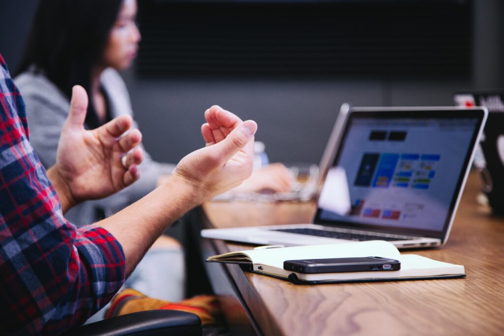 office-workers-communicate-with-hand-gestures